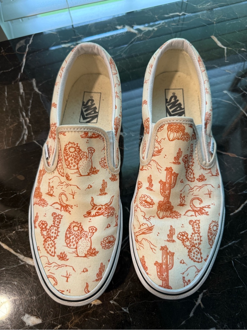 Vans Slip-On Sneakers in Cream with Orange Cactus Print